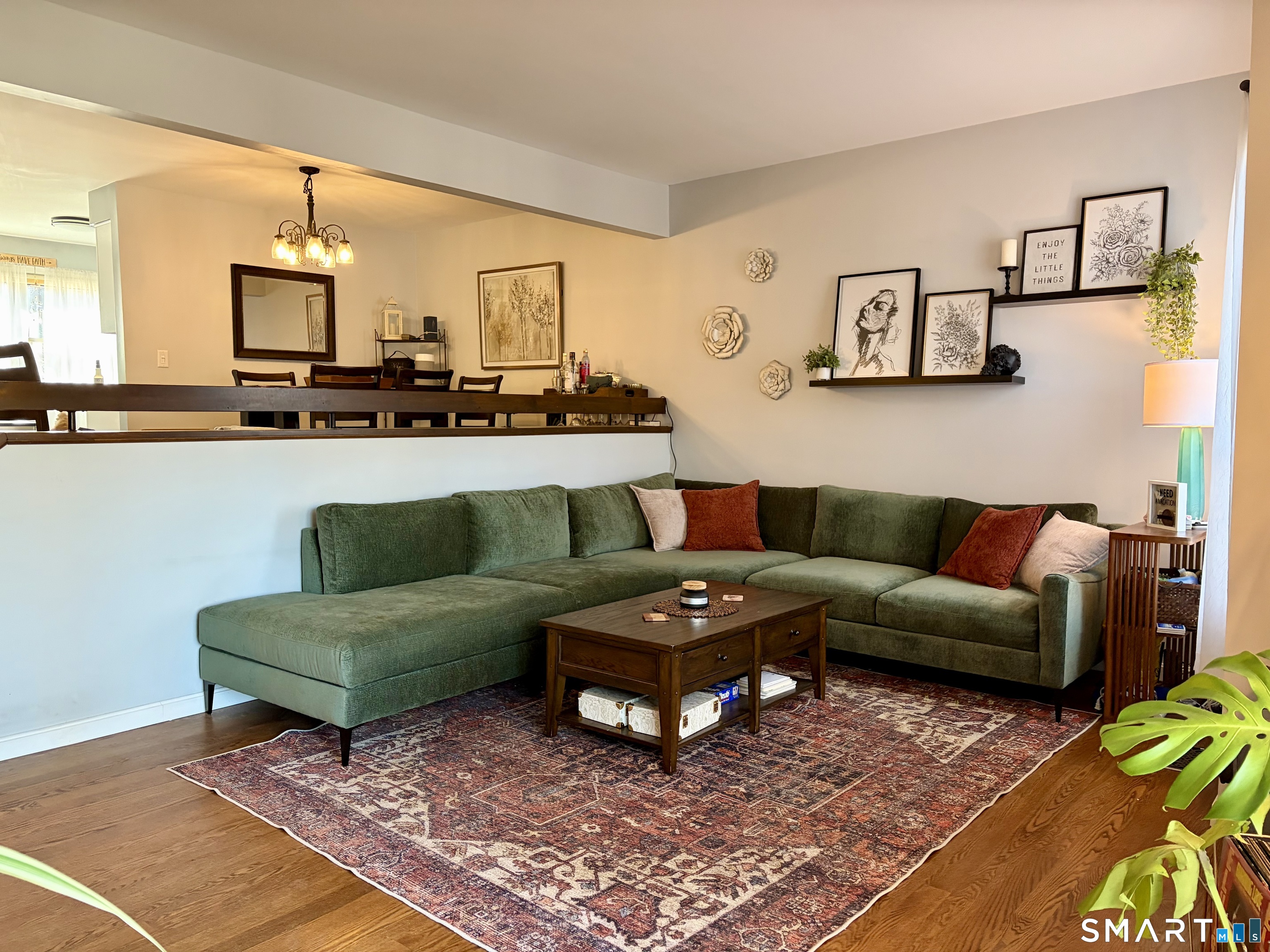 216 Natchaug Drive, Unit 216 Meriden, CT 06450 - Photo 2 of 40 a living room with furniture and a rug