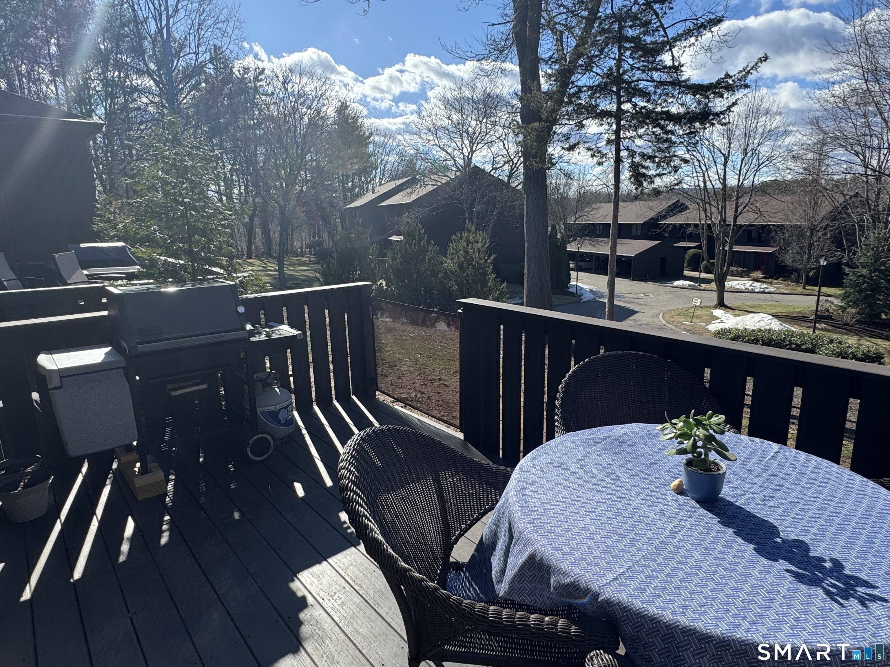 216 Natchaug Drive, Unit 216 Meriden, CT 06450 - Photo 35 of 40 a view of a balcony with furniture and outdoor space