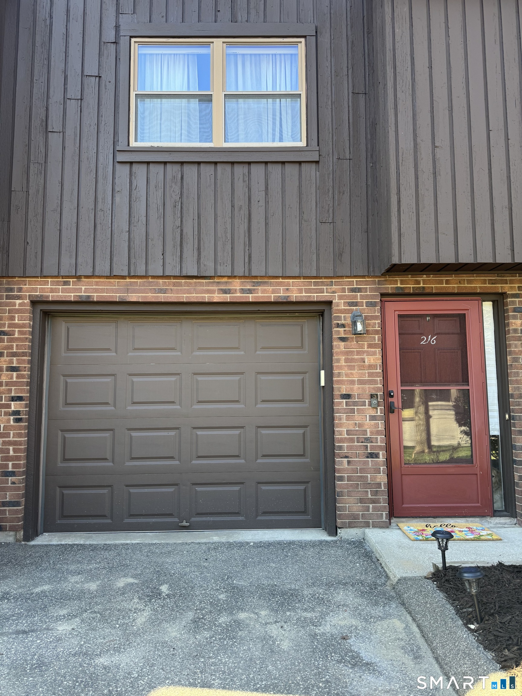 216 Natchaug Drive, Unit 216 Meriden, CT 06450 - Photo 36 of 40 a view of front door of house