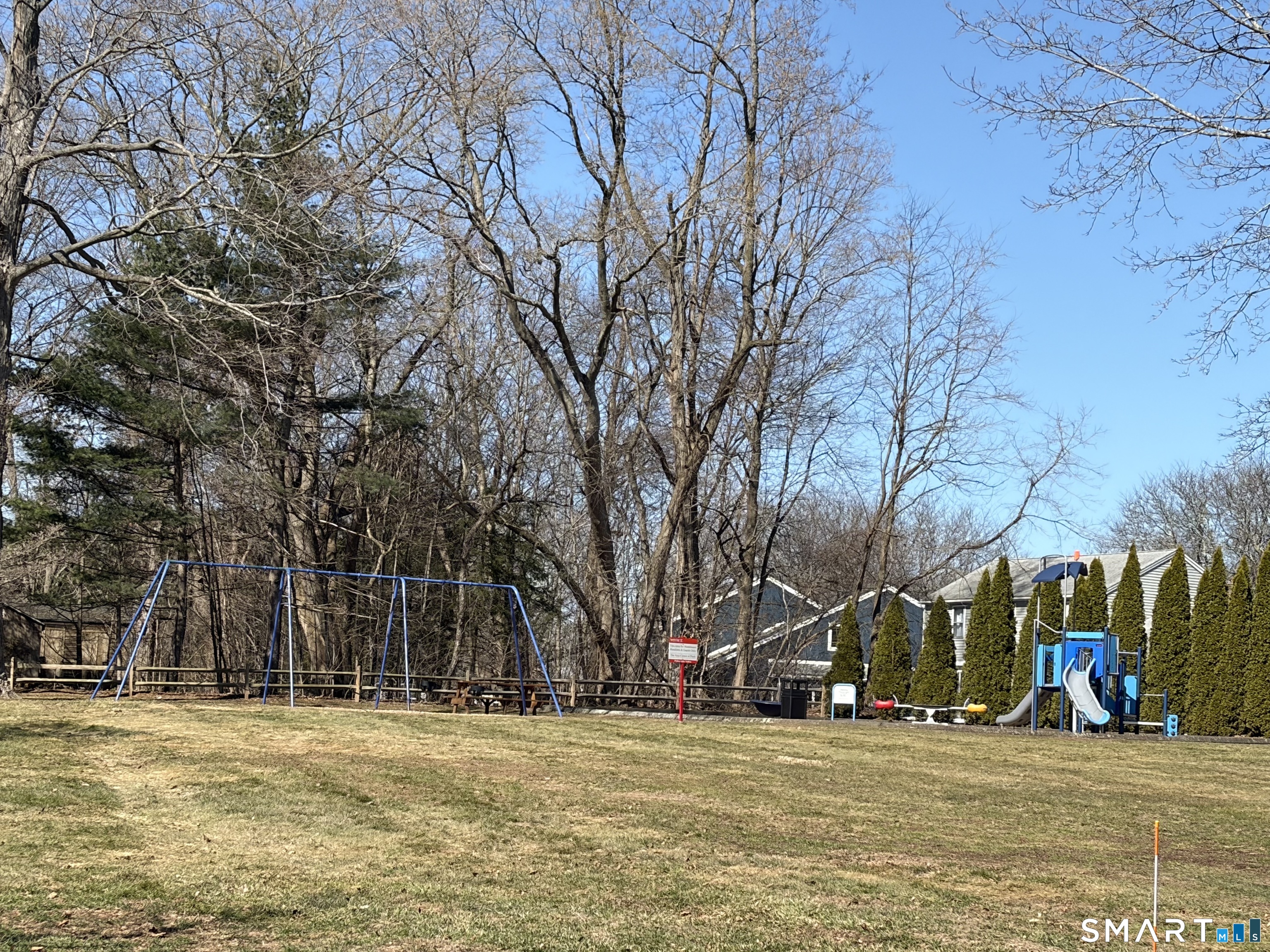 216 Natchaug Drive, Unit 216 Meriden, CT 06450 - Photo 39 of 40 a view of a building with trees