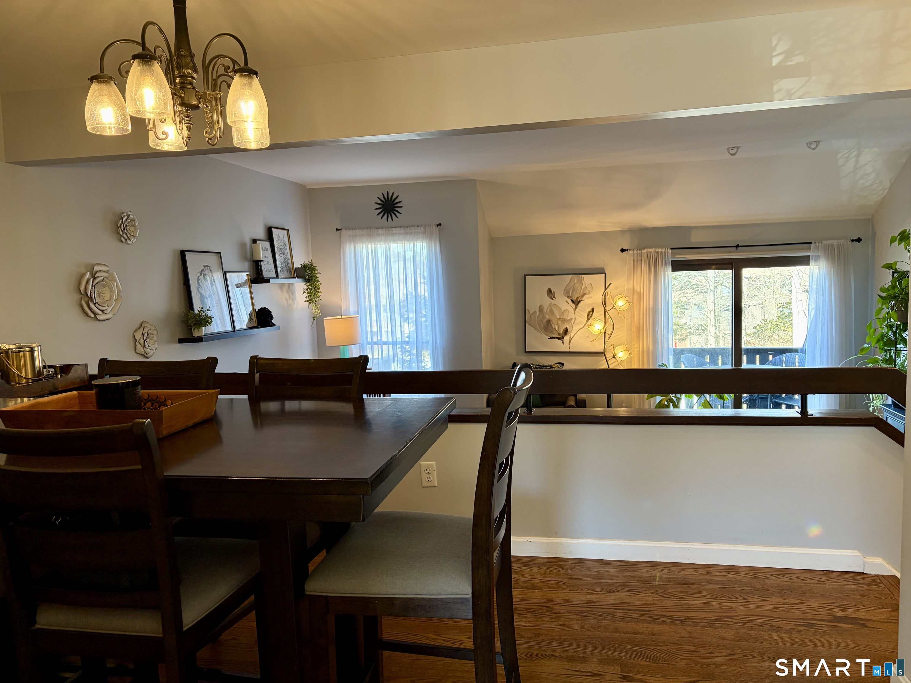 216 Natchaug Drive, Unit 216 Meriden, CT 06450 - Photo 6 of 40 a dining room with furniture and chandelier or kitchen view