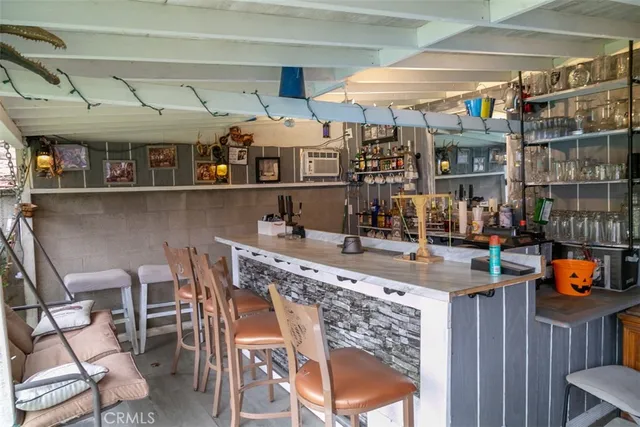 a view of dinning table and chairs in patio