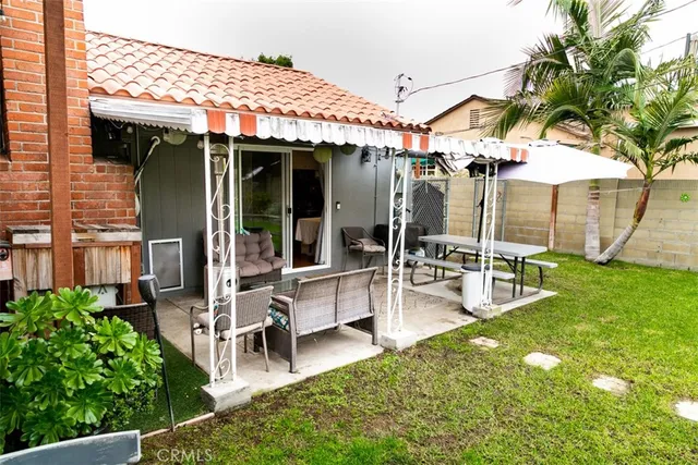 a view of a house with patio