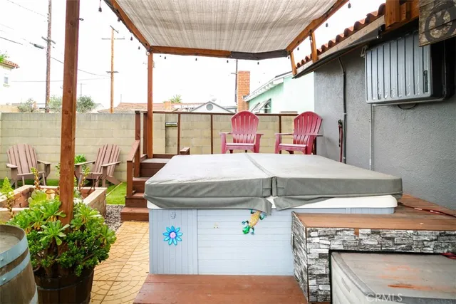 a outdoor view of a house with sitting area