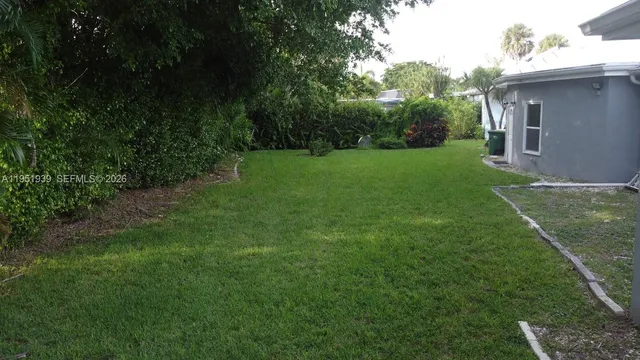 a view of a backyard with a garden