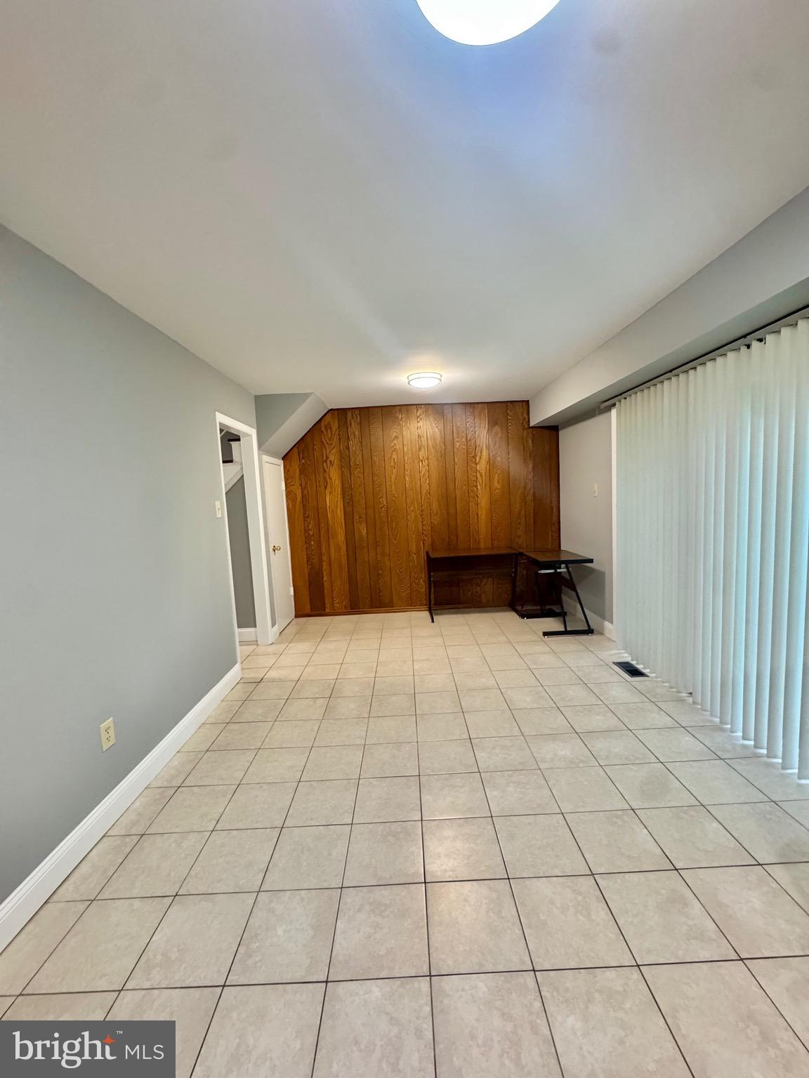 4908 Rocky Spring Lane Bowie, MD 20715 - Photo 13 of 36 a view of an empty room and window