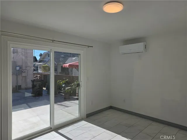 a bathroom with a shower and a sink
