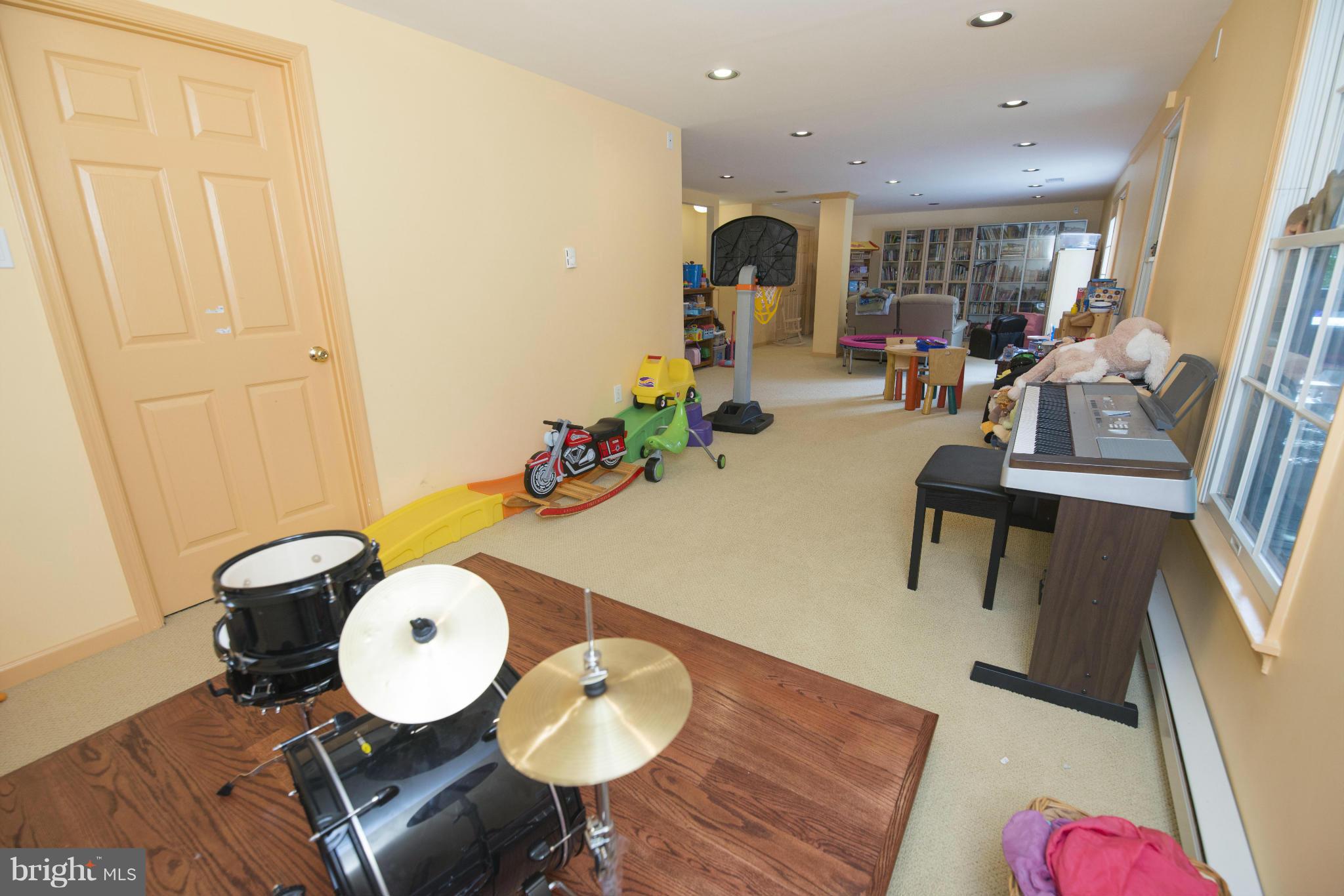 7521 Stream Crossing Road Baltimore, MD 21209 - Photo 18 of 26 Lower level rec room