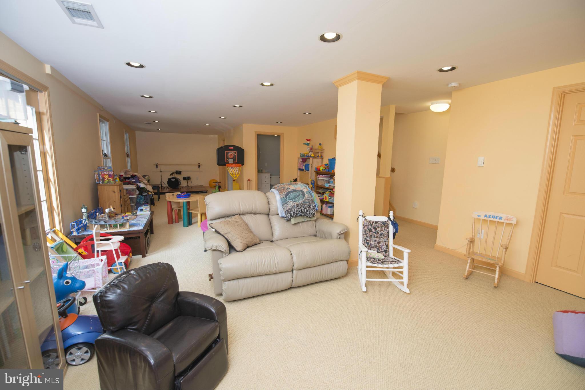 7521 Stream Crossing Road Baltimore, MD 21209 - Photo 21 of 26 Lower level rec room
