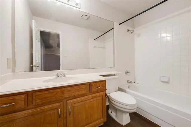 a view of a backyard with a small garden