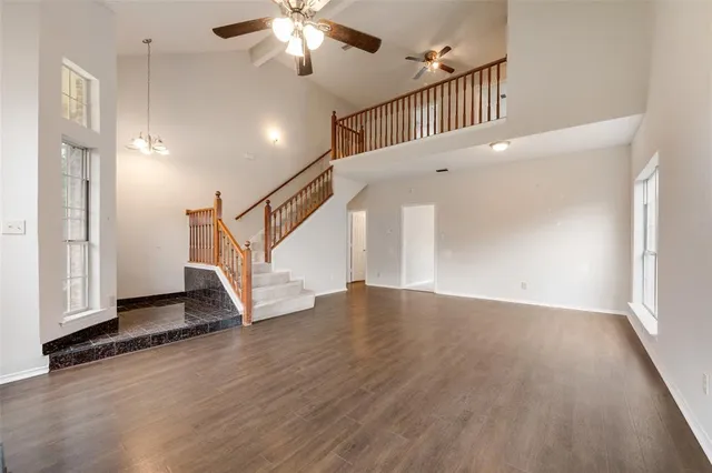 a view of an entryway with wooden floor