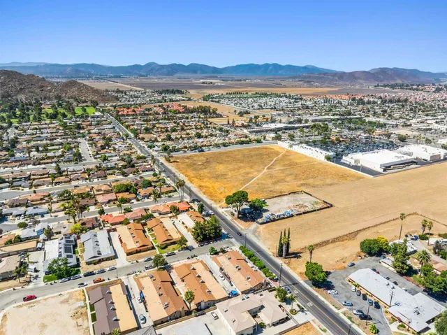 a view of a city with an ocean view