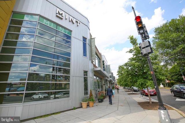 a group of cars parked in front of building