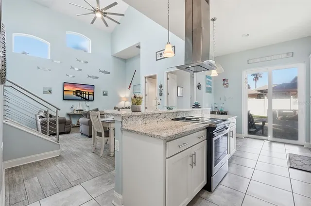 a spacious bathroom with a granite countertop sink a mirror and shower