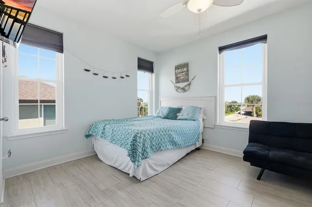 a view of a chairs and table in the balcony