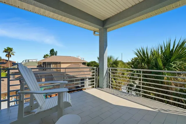 a view of a porch with furniture