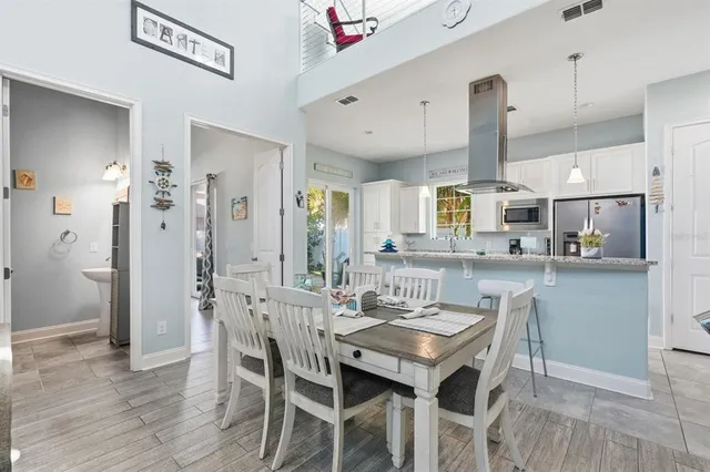 a kitchen with a sink cabinets and window