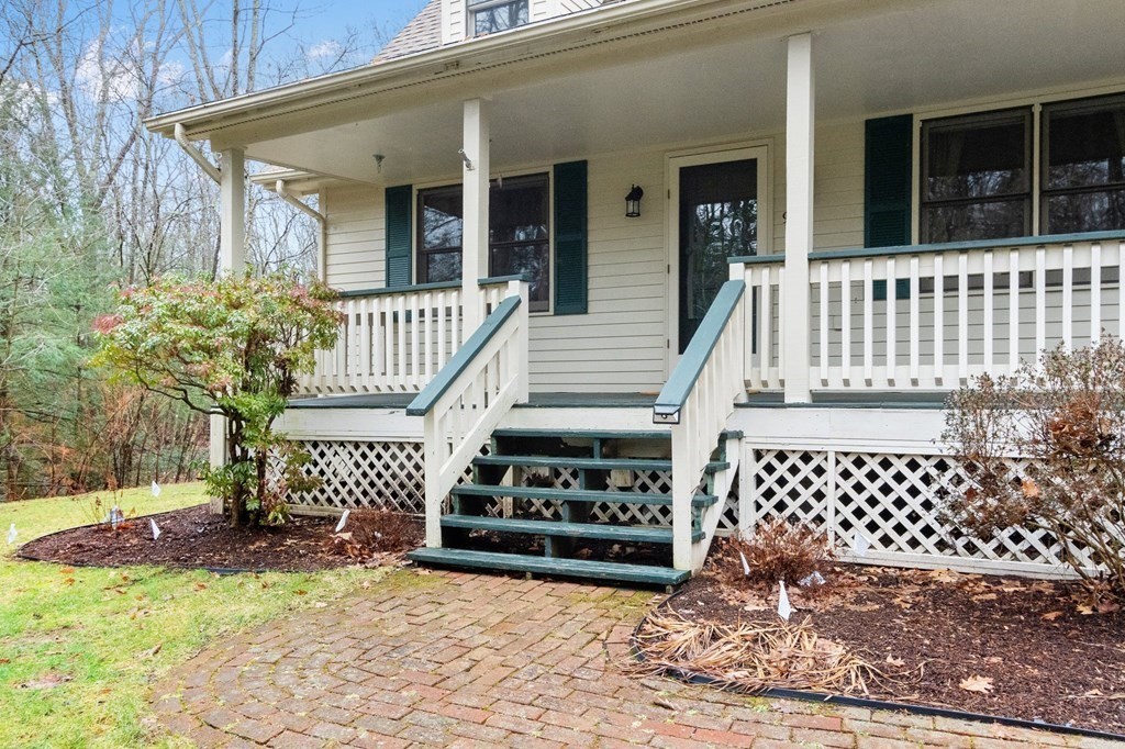 911 Conant Road Athol, MA 01331 - Photo 3 of 34 a view of a house with a large window and wooden fence