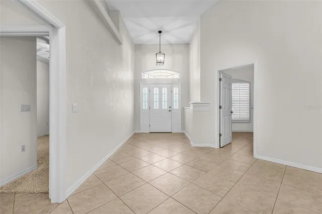 a kitchen with stainless steel appliances granite countertop a sink a stove cabinets and a sink