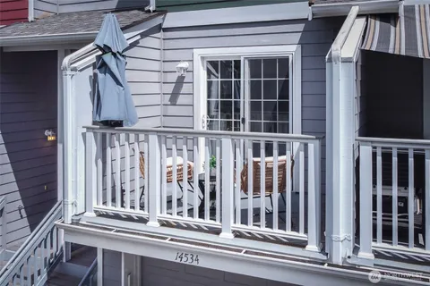 a view of a balcony with door