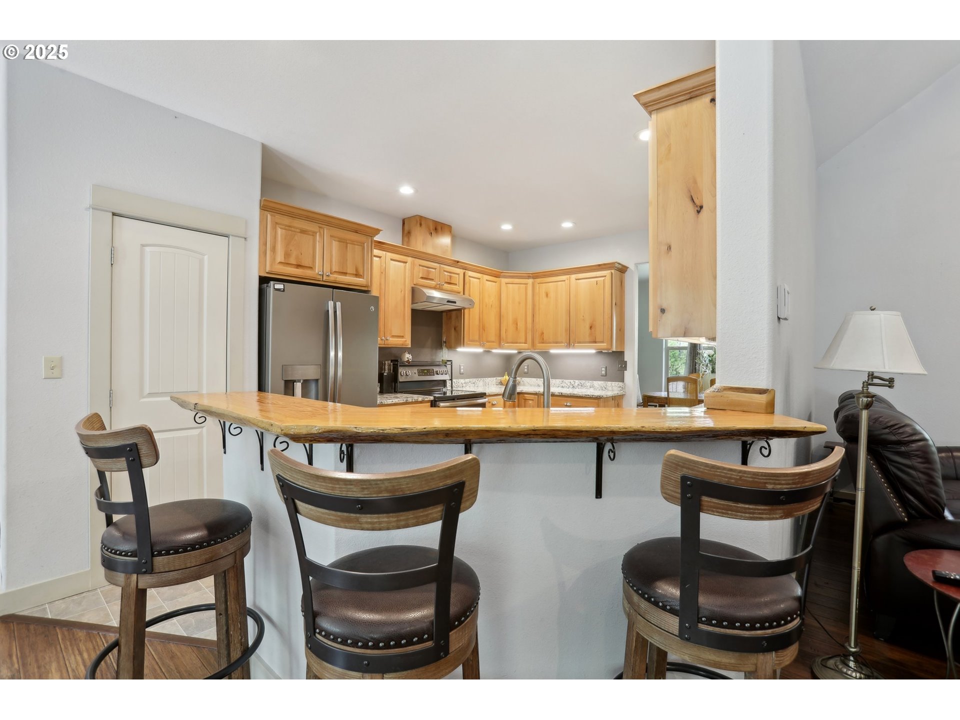 230 Riley Court Toutle, WA 98649 - Photo 17 of 48 a kitchen with a table and chairs in it