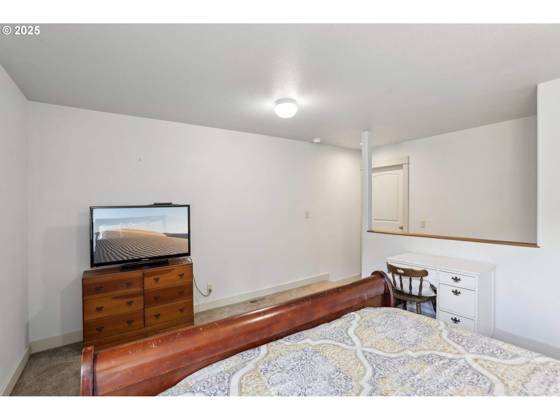 230 Riley Court Toutle, WA 98649 - Photo 29 of 48 a living room with furniture and flat screen tv
