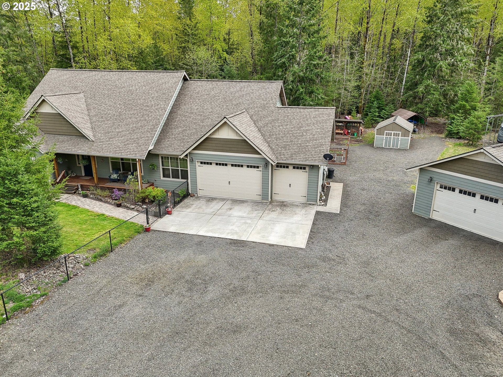 230 Riley Court Toutle, WA 98649 - Photo 3 of 48 a view of a house with a patio and a yard