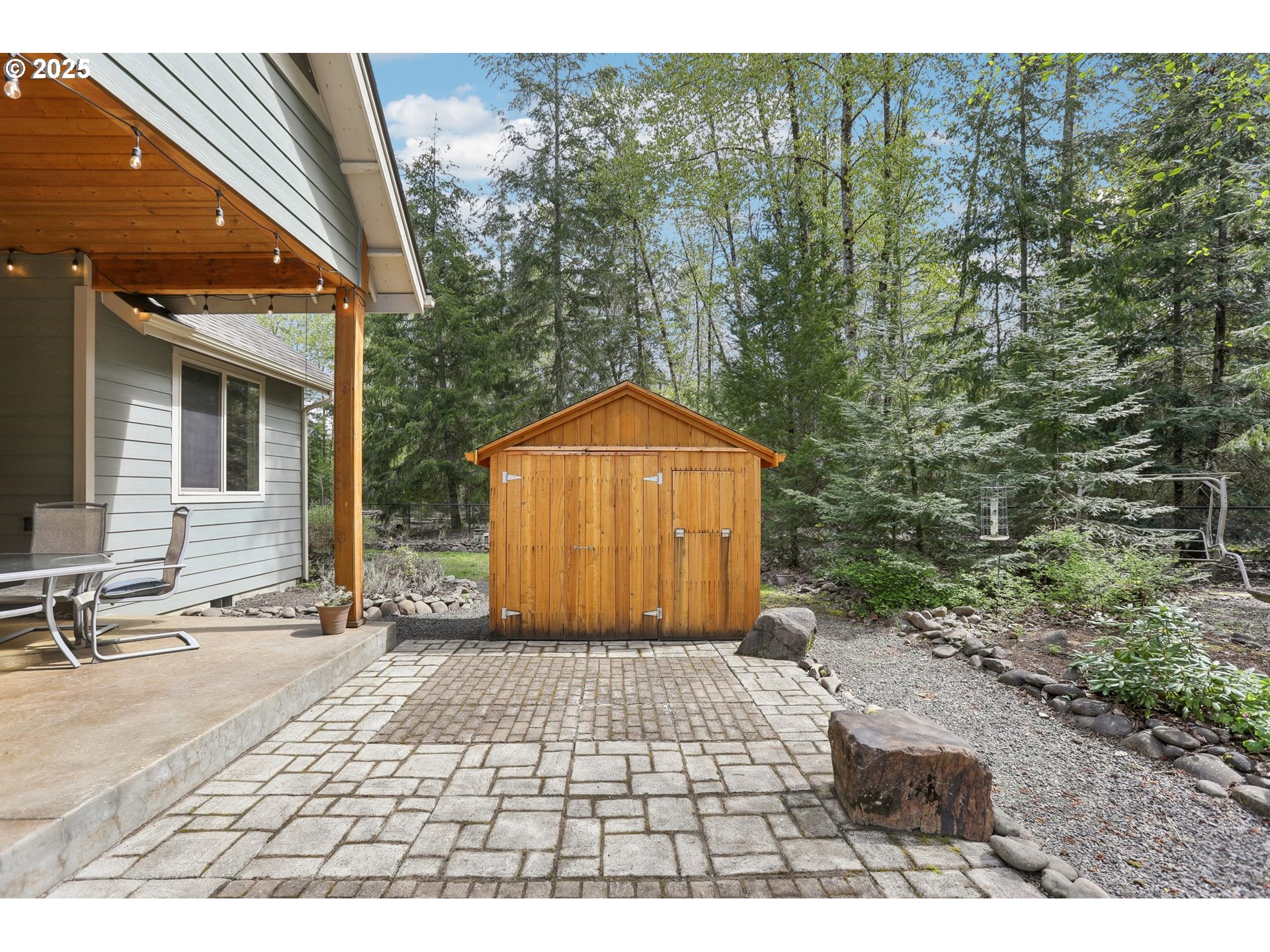 230 Riley Court Toutle, WA 98649 - Photo 38 of 48 a backyard of a house with yard and outdoor seating