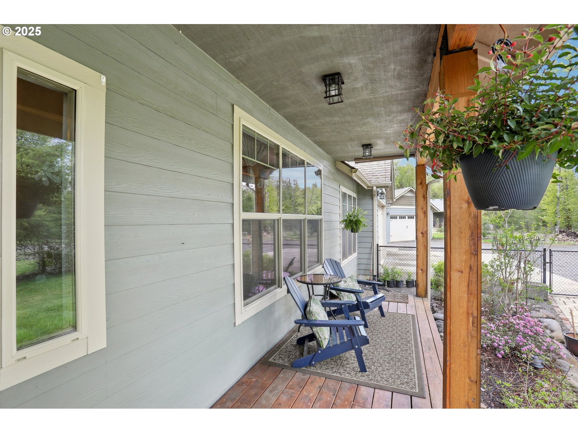230 Riley Court Toutle, WA 98649 - Photo 8 of 48 a balcony with chairs and with potted plants