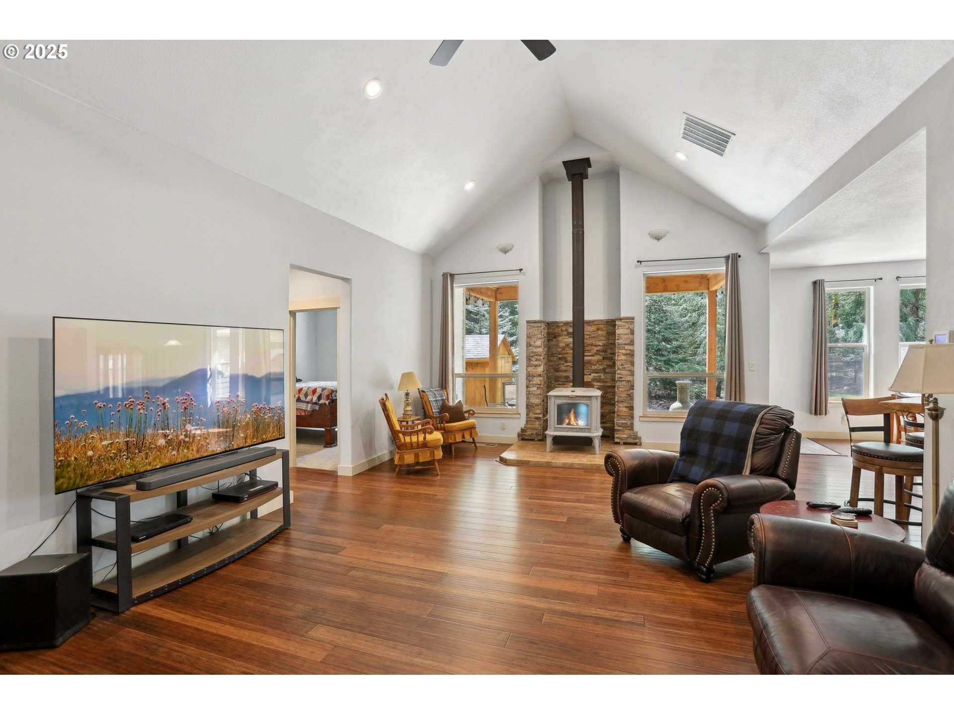 230 Riley Court Toutle, WA 98649 - Photo 9 of 48 a living room with furniture and a flat screen tv
