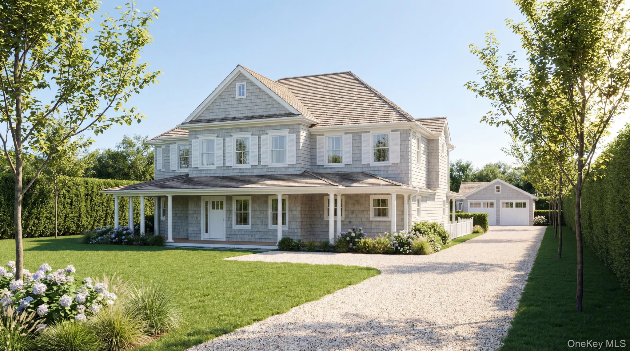 a front view of a house with a yard and potted plants