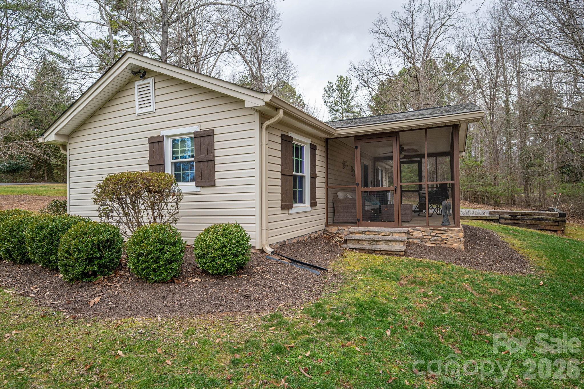 4485 River Oaks Road Lake Wylie, SC 29710 - Photo 11 of 16 a front view of a house with garden
