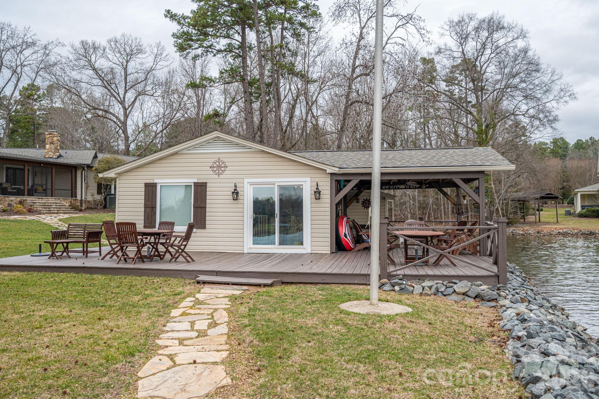 4485 River Oaks Road Lake Wylie, SC 29710 - Photo 12 of 16 a front view of a house with swimming pool