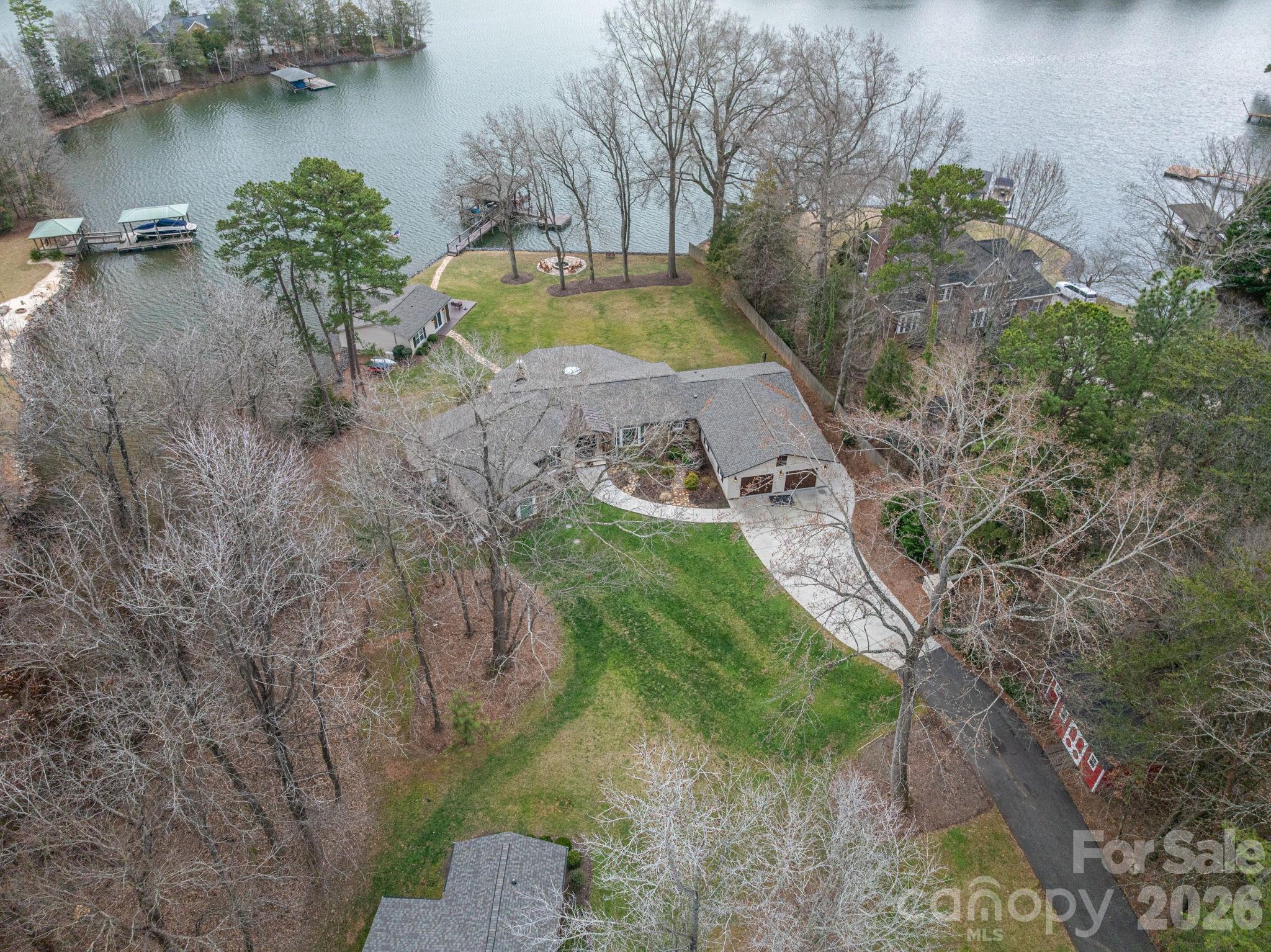 4485 River Oaks Road Lake Wylie, SC 29710 - Photo 13 of 16 a view of a lake with a yard