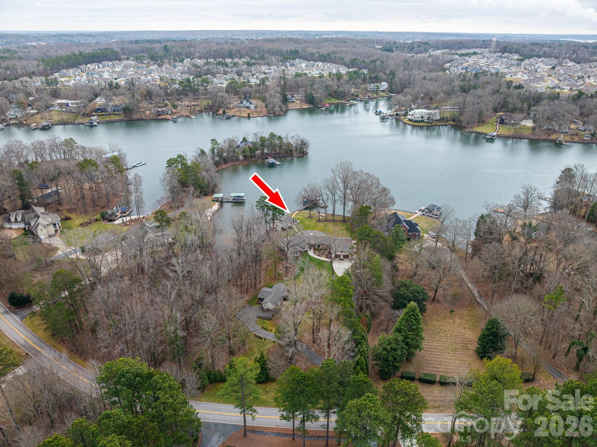 4485 River Oaks Road Lake Wylie, SC 29710 - Photo 5 of 16 an aerial view of residential houses with outdoor space and lake view