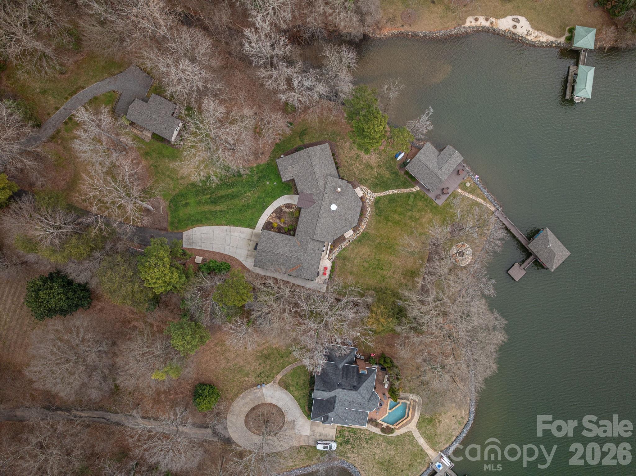 4485 River Oaks Road Lake Wylie, SC 29710 - Photo 10 of 16 an aerial view of a house with a yard and lake view