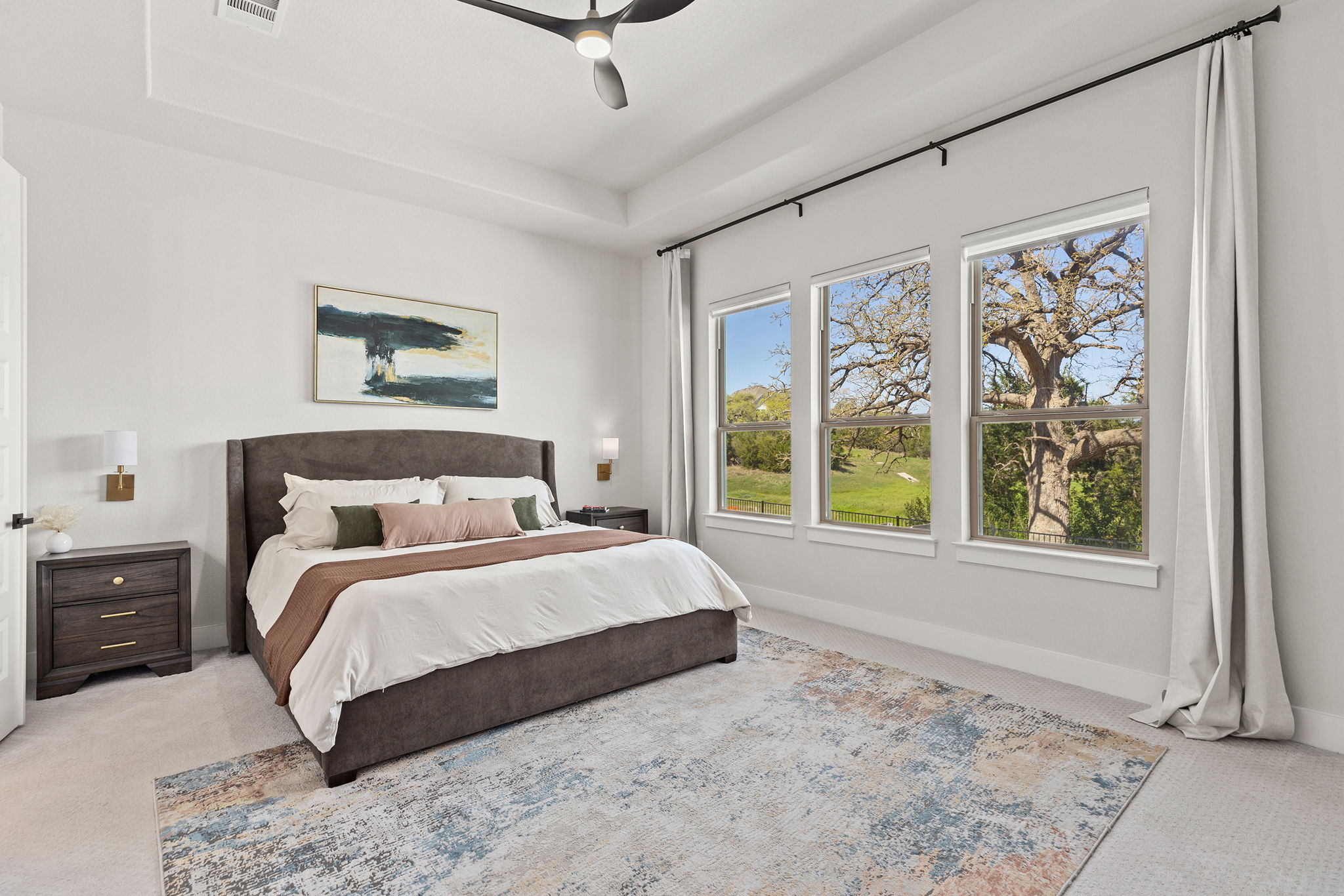 1224 River Trace Georgetown, TX 78628 - Photo 18 of 39 a bedroom with a large bed and a window