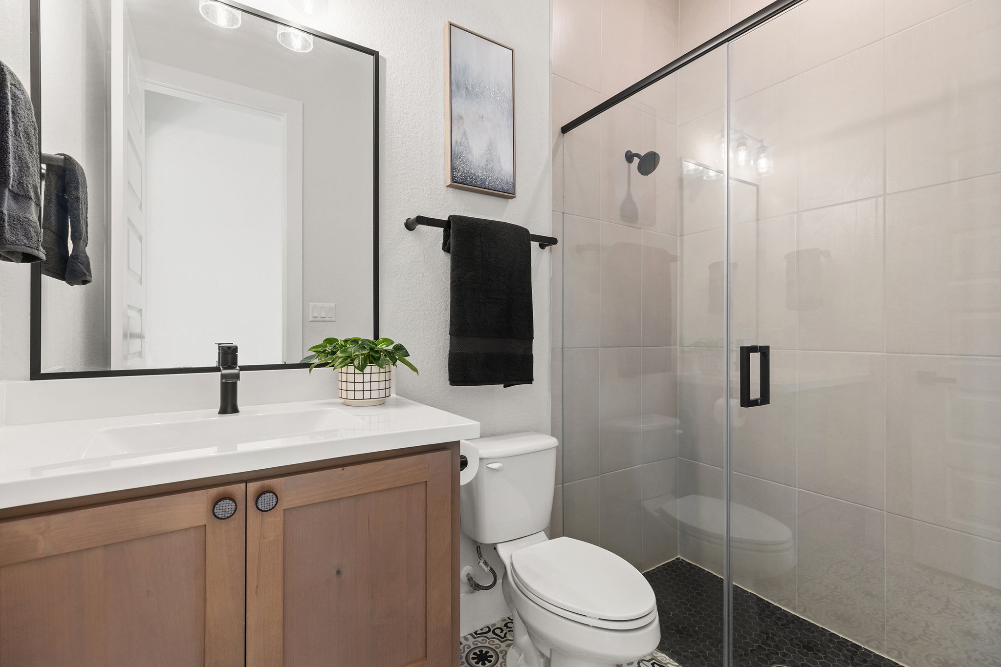 1224 River Trace Georgetown, TX 78628 - Photo 5 of 39 a bathroom with a sink a toilet and shower