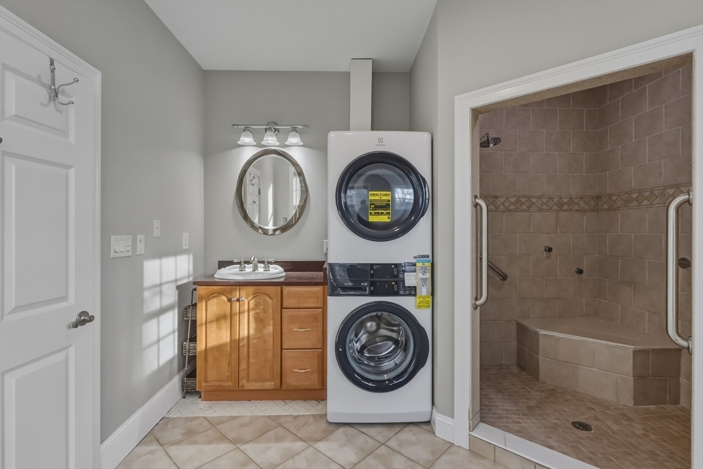 1327 Liberty Street, Unit 2 Braintree, MA 02184 - Photo 19 of 20 a view of washer and dryer in a utility room