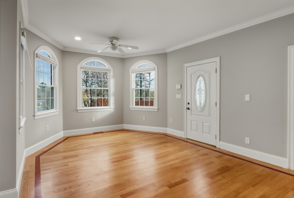 1327 Liberty Street, Unit 2 Braintree, MA 02184 - Photo 3 of 20 wooden floor in an empty room with a window