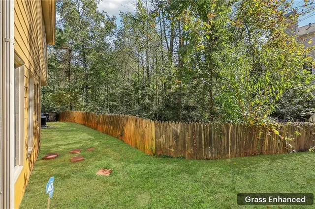 a view of a backyard with a small cabin
