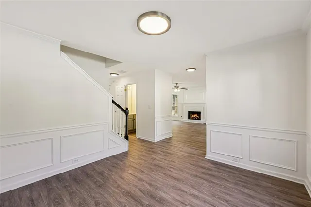 a view of a livingroom with wooden floor