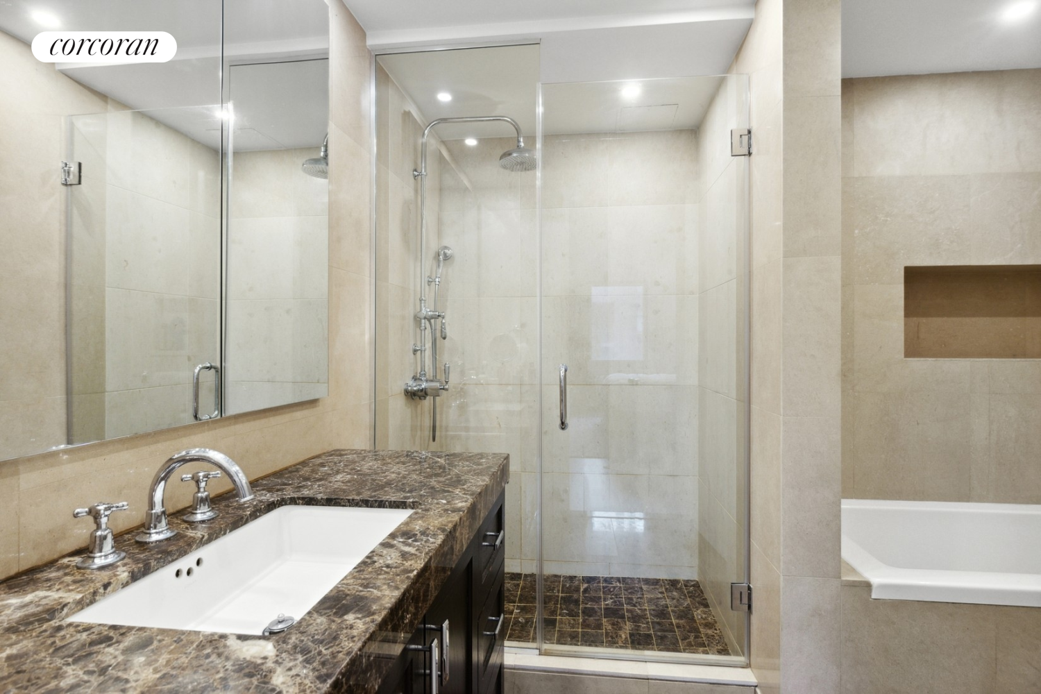 333 Rector Place, Unit 510 Manhattan, NY 10280 - Photo 6 of 10 a bathroom with a granite countertop sink a mirror and a shower