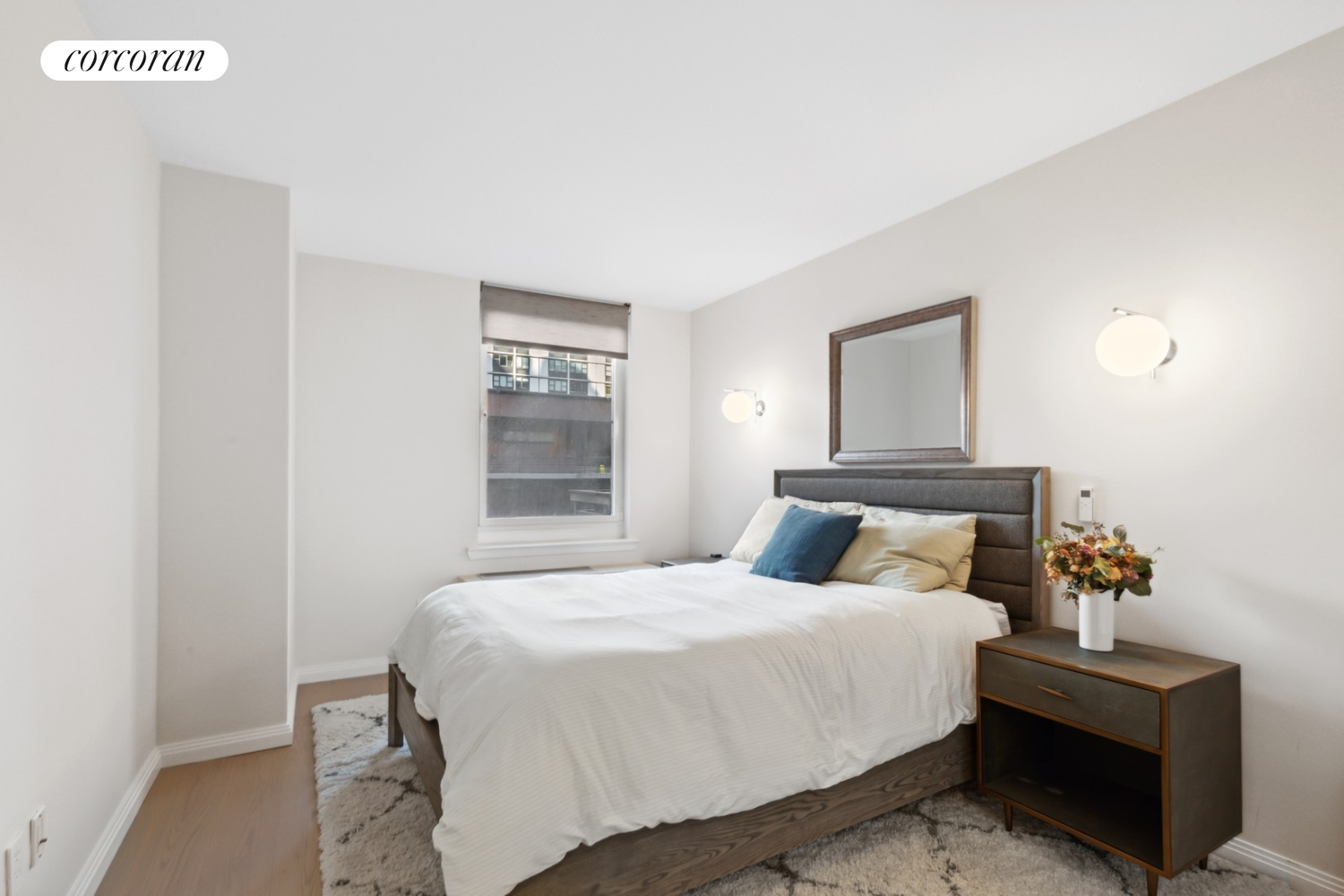 333 Rector Place, Unit 510 Manhattan, NY 10280 - Photo 7 of 10 a bedroom with a bed and window