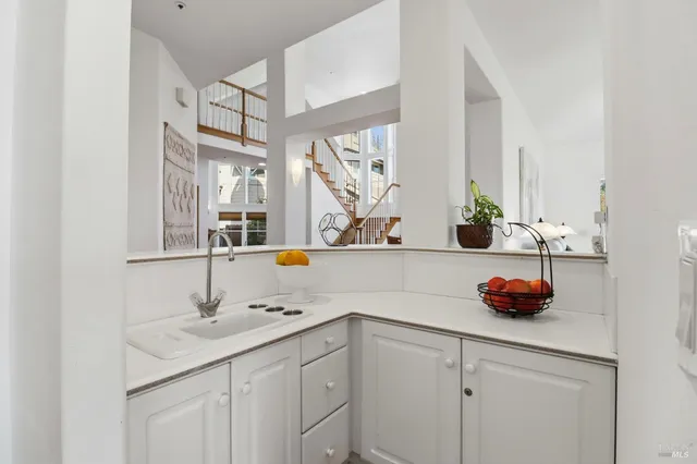 a workspace with furniture window and wooden floor