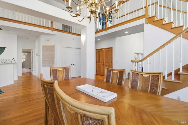 a view of hallway with wooden floor