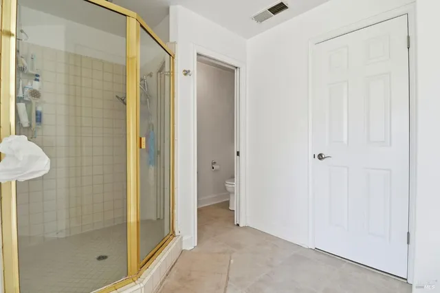 a utility room with sink dryer and washer