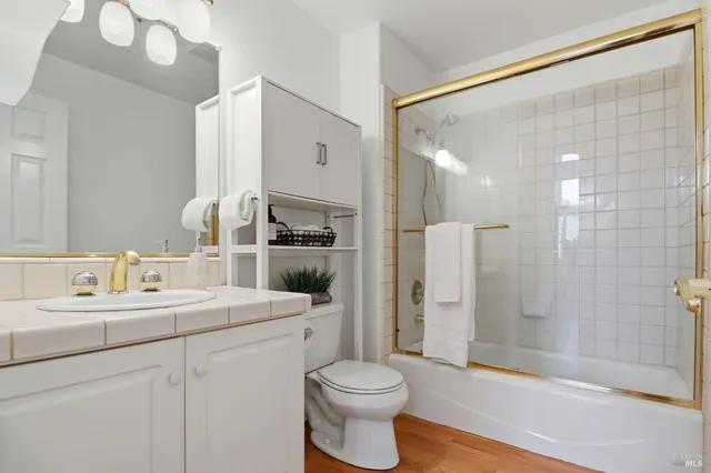 swimming pool view with a lake view