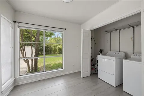 a view of utility room with washer and dryer