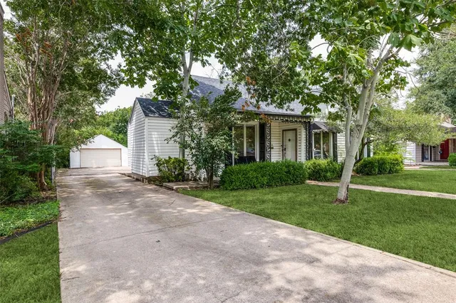 a house view with a garden space
